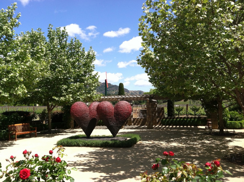 a heart shaped sculptures in a courtyard