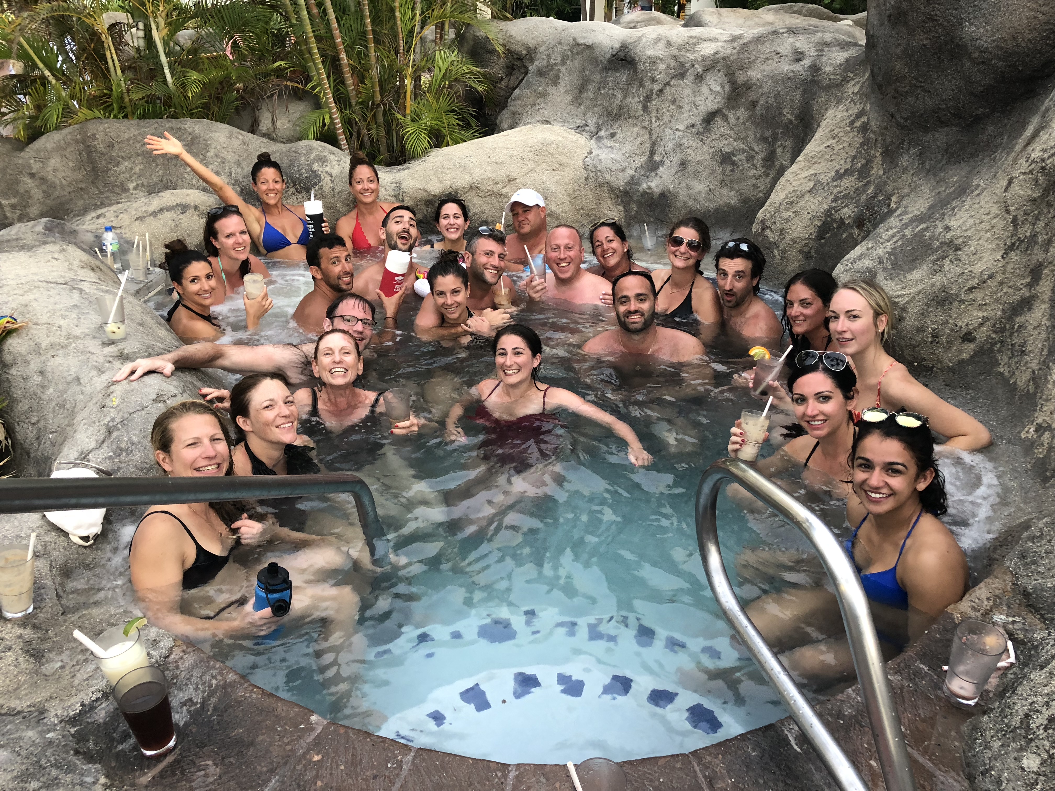 a group of people in a hot tub
