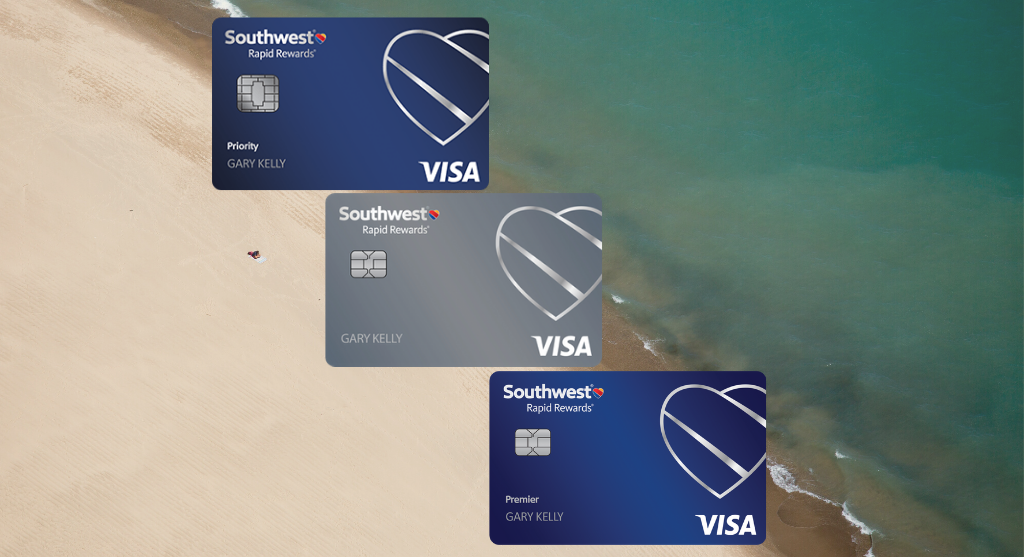a group of credit cards on a beach